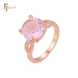 Solitario de dos tonos en oro rosa con grandes anillos redondos de piedras