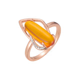Anillos de oro rosa con solitario de dos tonos y piedra naranja gigante