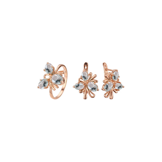 Conjunto de flores de tres piedras de oro rosa