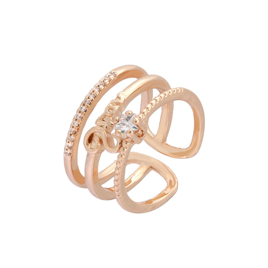 Anillos abiertos de tres bandas de oro rosa con pavé de circonitas blancas
