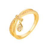 Anillo de boda de oro de 14 quilates y oro rosa con pavé de circonitas.