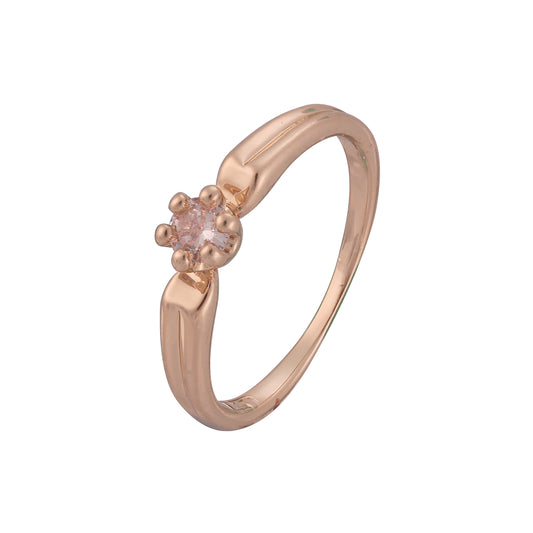 Anillo solitario con garras en oro blanco de 14 quilates y oro rosa.