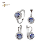 Conjunto de joyería con colgante y anillos chapados en oro blanco con halo de circonitas cúbicas de gran tamaño y forma redonda.